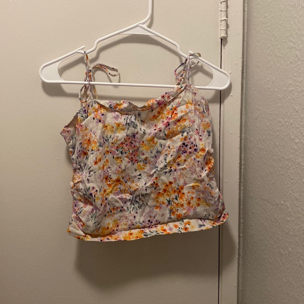 Floral print H&M tank top with adjustable straps.